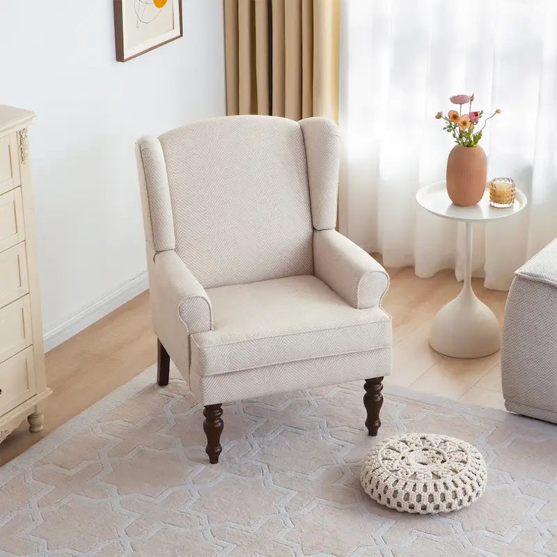 Sillón decorativo con patas torneadas y brazos redondos