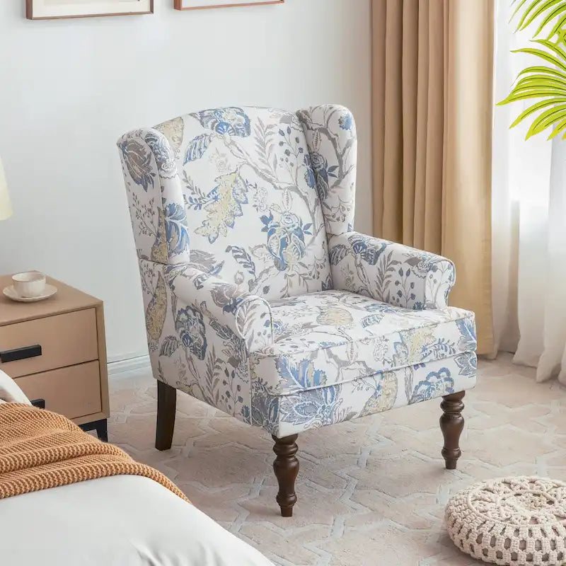 Sillón decorativo con patas torneadas y brazos redondos