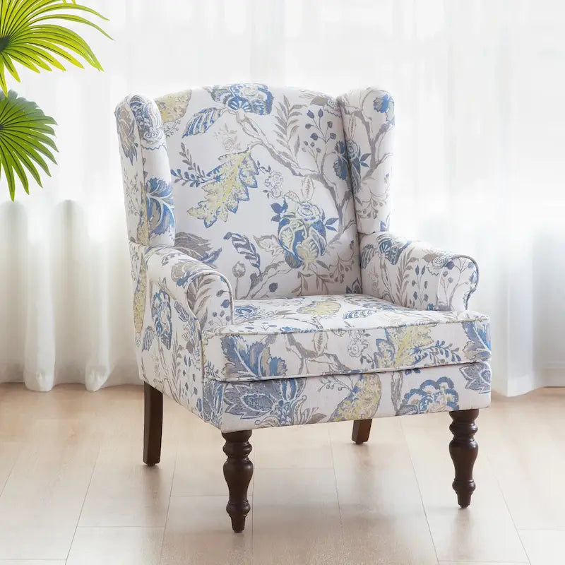 Sillón decorativo con patas torneadas y brazos redondos