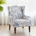 Sillón decorativo con patas torneadas y brazos redondos