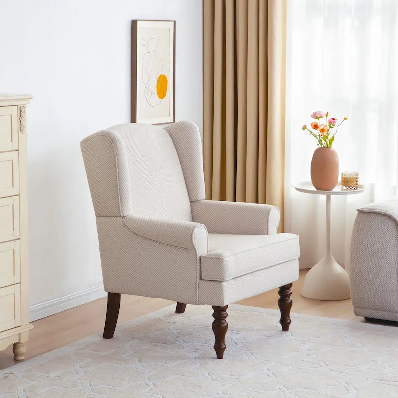Sillón decorativo con patas torneadas y brazos redondos