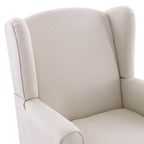 Sillón decorativo con patas torneadas y brazos redondos