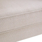 Sillón decorativo con patas torneadas y brazos redondos