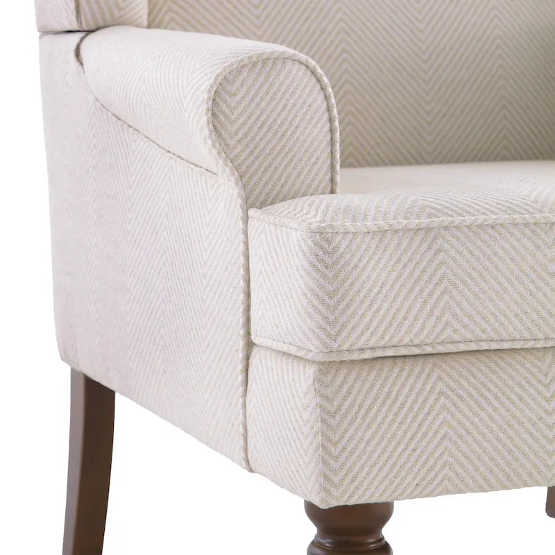 Sillón decorativo con patas torneadas y brazos redondos