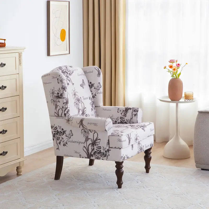 Sillón decorativo con patas torneadas y brazos redondos