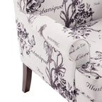 Sillón decorativo con patas torneadas y brazos redondos