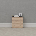 Cómoda de madera manufacturada de 3 cajones
