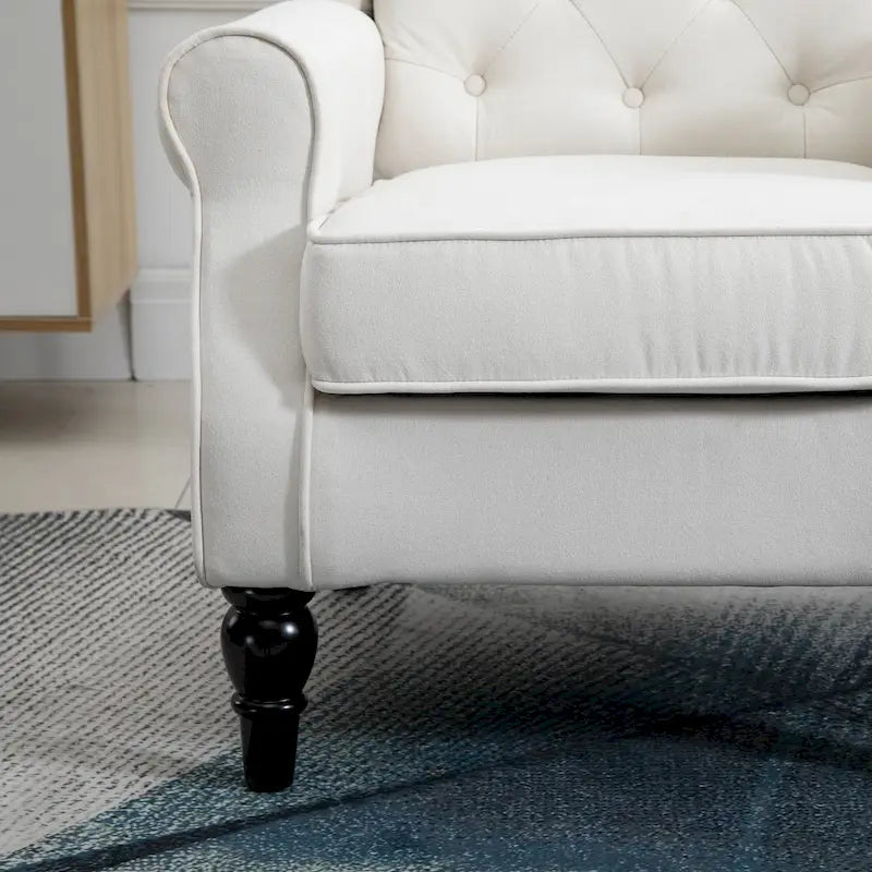 Sillón decorativo tapizado con patas de madera