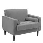 Sillón moderno tapizado de pana con brazos y cojines