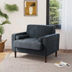 Sillón moderno tapizado de pana con brazos y cojines