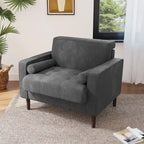 Sillón moderno tapizado de pana con brazos y cojines