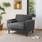 Sillón moderno tapizado de pana con brazos y cojines