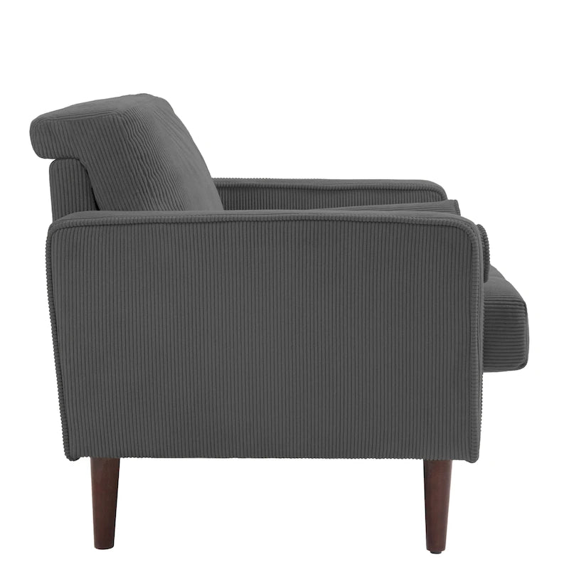 Sillón moderno tapizado de pana con brazos y cojines