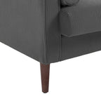 Sillón moderno tapizado de pana con brazos y cojines