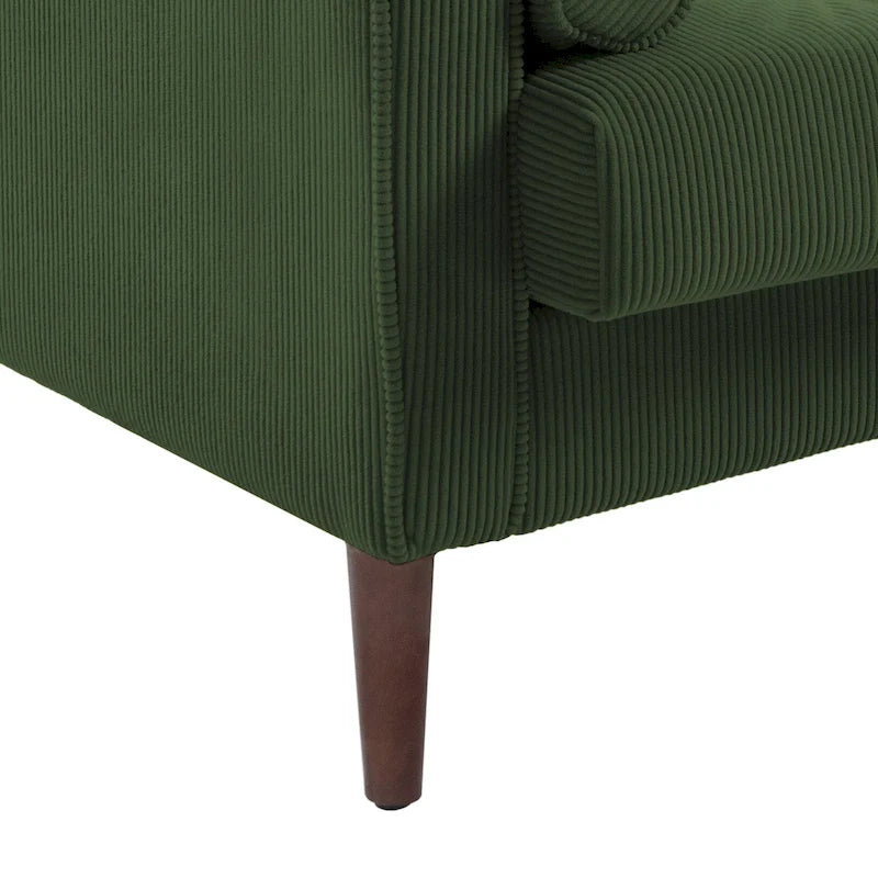 Sillón moderno tapizado de pana con brazos y cojines