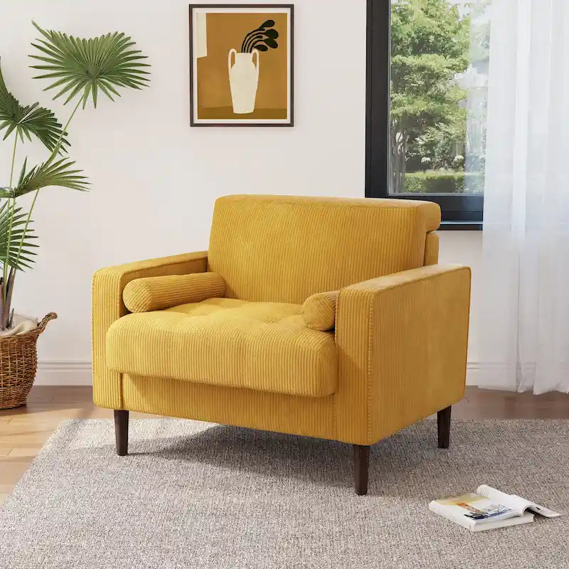 Sillón moderno tapizado de pana con brazos y cojines