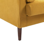 Sillón moderno tapizado de pana con brazos y cojines
